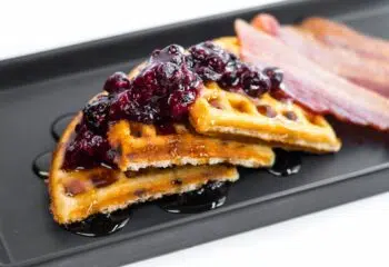 #005  Chocolate Chip Protein Waffles with Bacon, Syrup and Macerated Berries