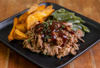 #146  BBQ Pork Platter with Southern Style Green Beans and Potato Wedges