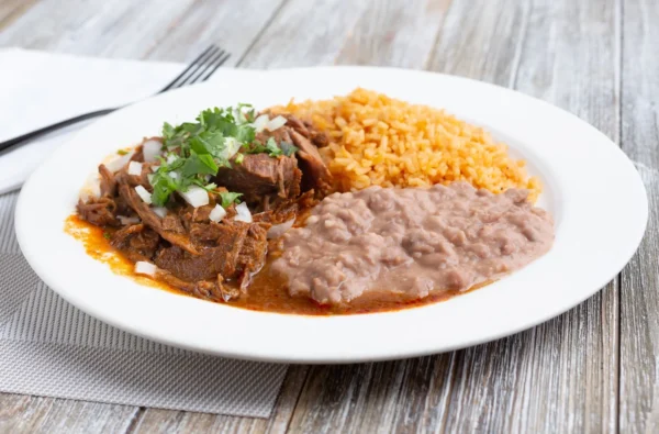#107  Birria Fiesta Plate with Spanish Rice, Refried Beans, and Mexican Street Corn